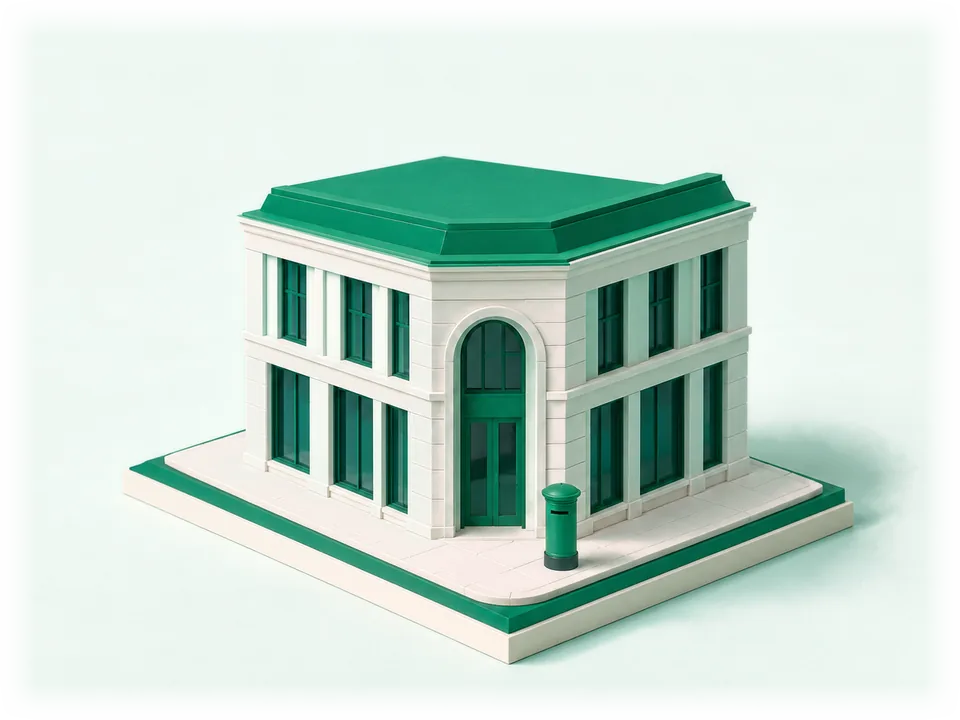 Model of a corner office building with a large arched entrance and tall windows, an emerald street postbox in front of it